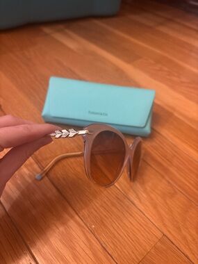 Tiffany & Co. Women's Round Sunglasses in Light Pink with Leaf Accent